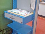 a machine that is sitting on a cart in a room