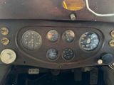 a close up of the dashboard of an old airplane