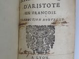 a book with a picture of a coat of arms on it