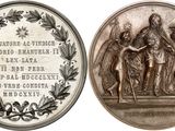 four oval metal plaques with images of jesus and other religious figures