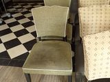 four chairs that are sitting next to each other on the floor