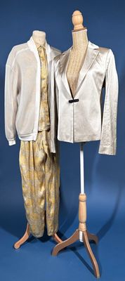 two mannequins that are standing next to each other