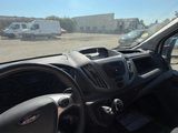 a view from inside of a car of a parking lot