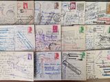 many different types of postcards on the table