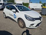 a picture of a white car parked in a parking lot