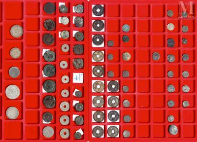 a lot of coins that are in a red box