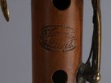 a close up view of a musical instrument with a bird on it