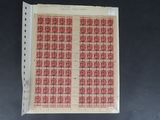 une feuille de papier sur laquelle sont dessinés des carrés rouges et noirs