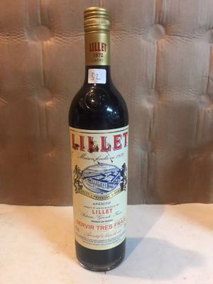 a bottle of wine that is sitting on a table