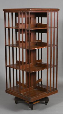 wooden display case with glass doors and shelves on casteors
