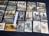 a lot of old postcards that are on a table