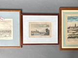 three framed pictures of a city with a flag hanging on a wall