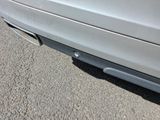 a car that is parked on the side of the road
