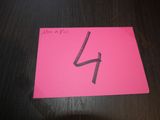 a pink post it note with the number 4 on it