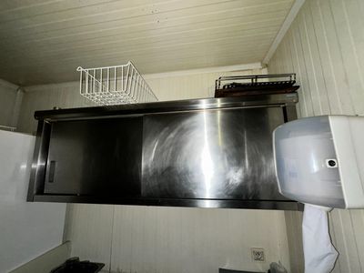 an image of a stainless steel sink in a kitchen