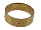 a close up of a gold ring on a white background