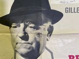 a poster of a man wearing a hat and a fedora