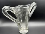 an image of a clear glass vase on a table