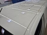 an image of a washing machine in a garage