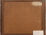 an old picture frame with a piece of paper taped to it