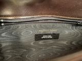 the inside of a brown bag with a label on it