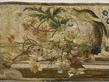 a picture of a picture of a bird and flowers on the wall