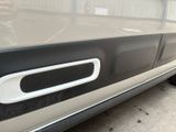 a close up of a car door handle on the side of the car