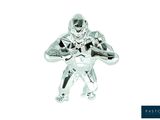 a silver figurine of a football player holding a ball