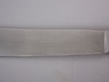 a knife that is laying on a table