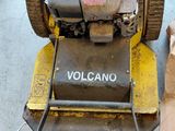 an image of a lawn mower being worked on