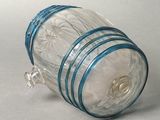 a glass jar with a blue band around it