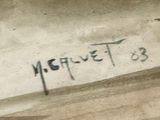 graffiti on the side of a concrete wall with a stop sign on it
