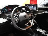 a car dashboard with a steering wheel and a dash board
