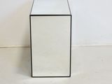 an image of a glass table with a mirror top on a white floor