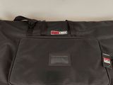 an image of a black bag sitting on top of a table
