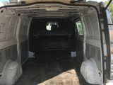 the back of a van with the door open and the back of the van with the door open
