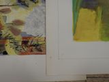 two paintings on the wall next to each other