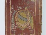 an old book with a picture of a fish on it