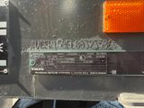 a close up of a sign on a truck ' s back