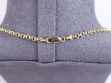 a close up of a gold chain bracelet on a mannequin mannequin mannequin mannequin mannequin mannequin mannequin mann
