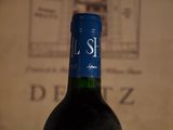 a bottle of wine that is sitting on a table