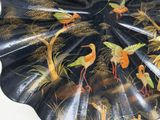 an image of a decorative plate with birds painted on it