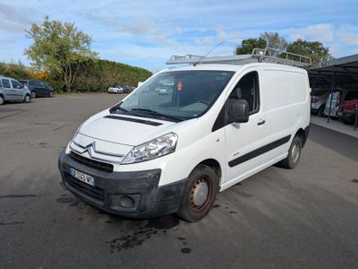 a white van that is parked in a parking lot