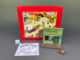 an image of a box with a toy building and a card game