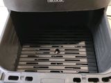 a close up of a grill on a counter top