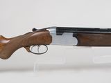 a close up of a rifle with a wooden barrel on a clear stand