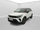 a white car in a white room with a red trim