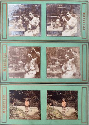 an old photo of a tennis player holding a racquet on a tennis court