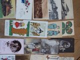 many cards on the table with pictures of people on them