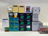 many boxes of different types of electronic equipment on the table